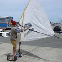 Skateboard windsurfer