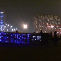 Activists detained after lighting up “Free Tibet” LED throwies banner near Olympics