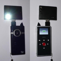 Light + charger for flip cams