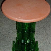 Glass bottle table