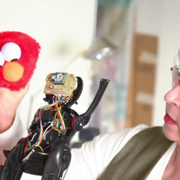 Choreographing an Army of Elmo Robots