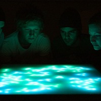 Interactive table glows with conversation