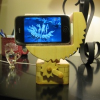 Wooden hand crank iPhone dock automata