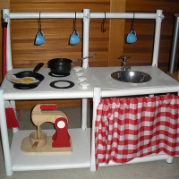 Play kitchen made from shelving parts