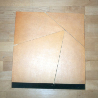 Hinged square-to-triangle dissection table