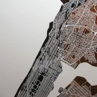 Meticulously cut paper maps of NYC