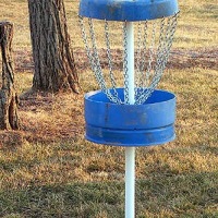 Blue barrel Frisbee golf target