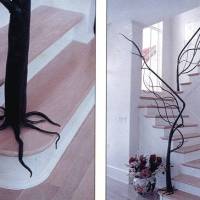 Beautiful staircase railing looks like a tree