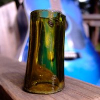 Guitar slide from glass bottle