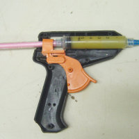 How to Hack a Syringe into a Glue Gun to Make an Applicator