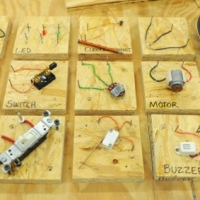 Teaching kids electronics using wooden blocks