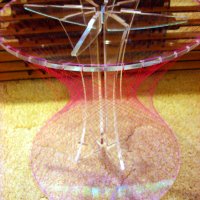 Hyperboloid stool from acrylic and monofilament