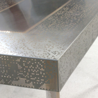 Laser Cut Stainless Steel “Lace” Table Covering