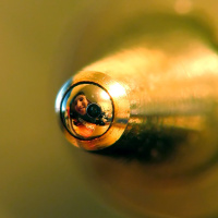 Macro self portrait in the ball of a ball-point pen