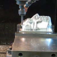 Time lapse CNC-milling a face from solid aluminum