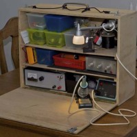 Portable electronics desk