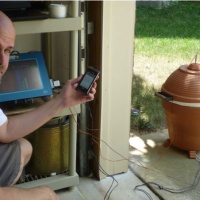 Homebuilt meat smoker texts your phone when the meat is ready!