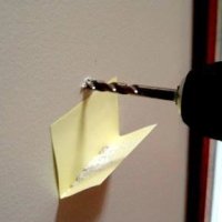 Use a post-it to catch drill dust