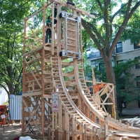 Students make vertical wooden roller coaster track