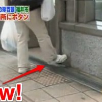 Foot-operated elevator button