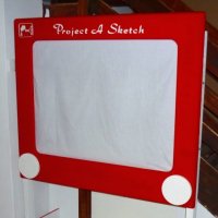 Giant etch-a-sketch built using projector