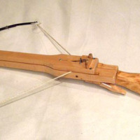 Marble-Shooting Wooden Crossbow Punches Through Plywood