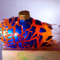 An Airgun Pellet Shattering A Jello-Filled Xmas Ornament…