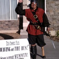 Dad Greets the Bus Each Morning in Costume