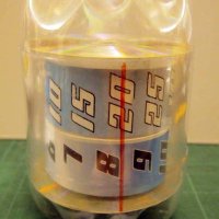 Soda Bottle “Cylinder Clock” Does a Lot, With a Little