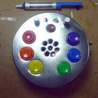 Atari Punk Console in a Fruit Cake Tin