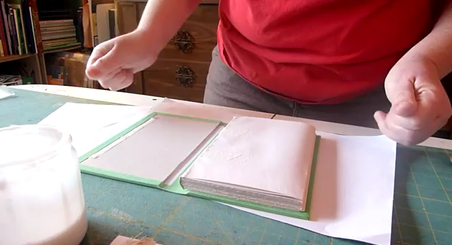 A picture of a step in the DIY casebinding process for handmade hardback books