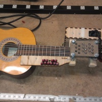 Arduino Mod Lets Disabled Musicians Play Guitar