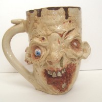 Macabre Mugs by Making Faces Pottery