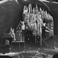 Etching Drawings of Castles Onto Grains of Sand