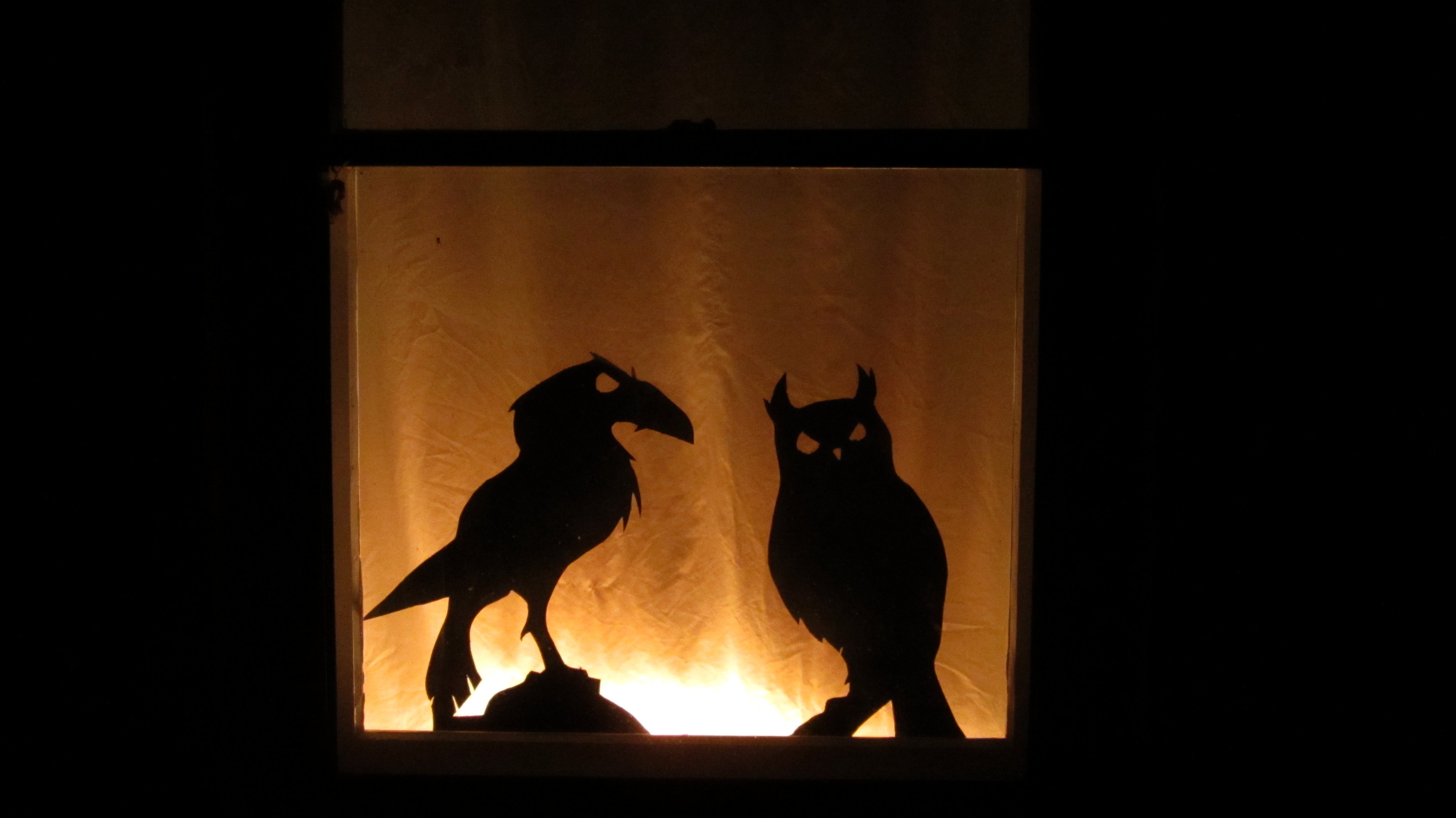 Spooky Window Silhouettes With Follow-Me Eyes