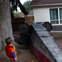 Cardboard X-Wing Crashes in Suburban Front Yard