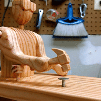 This Clockwork Carpenter Is Made from a Single 2×4