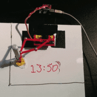Watch This Tiny Adorable Drawbot Write Out the Time