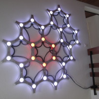 Illuminate Your Walls with Beehive-Inspired Modular Lighting