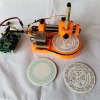 These Tiny Drawbots Put Unique Doodles on Coasters