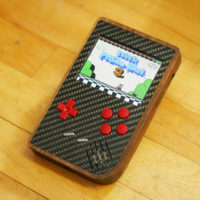 Raspberry PiBoy Mixes Walnut, Carbon Fiber, and Retro Gaming