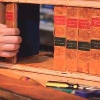 This Clever Secret Hiding Spot Looks Like an Antique Bookshelf