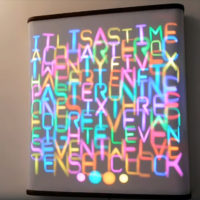 This Servo Driven Word Clock Creatively Mixes Light and Motion